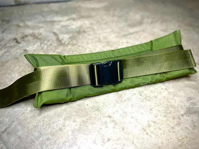Load image into Gallery viewer, Green tactical belt with a black buckle on a concrete surface