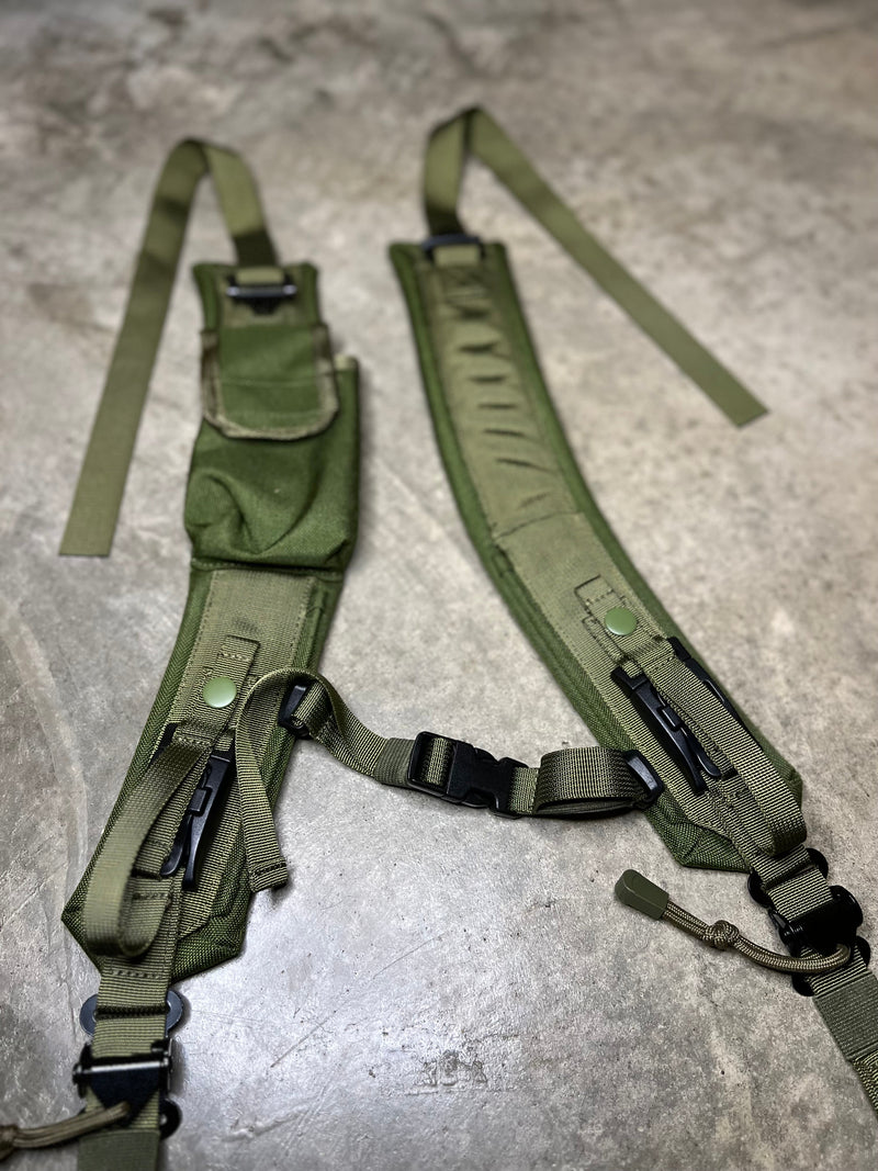 Load image into Gallery viewer, Green tactical harness on a concrete floor
