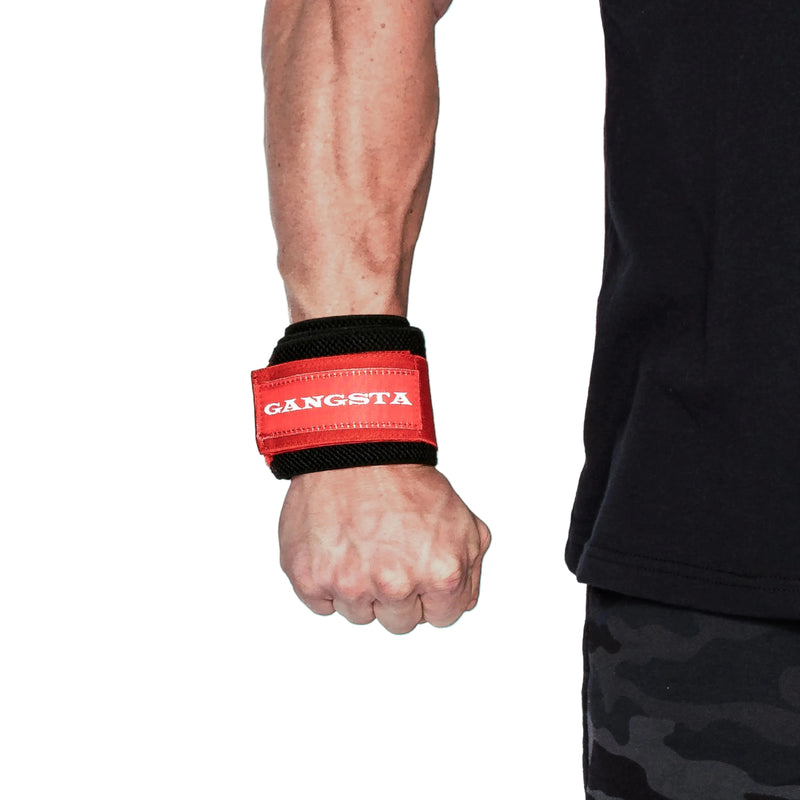 Load image into Gallery viewer, A person's forearm wearing a red wrist wrap with the word 'GANGSTA' written in white letters.