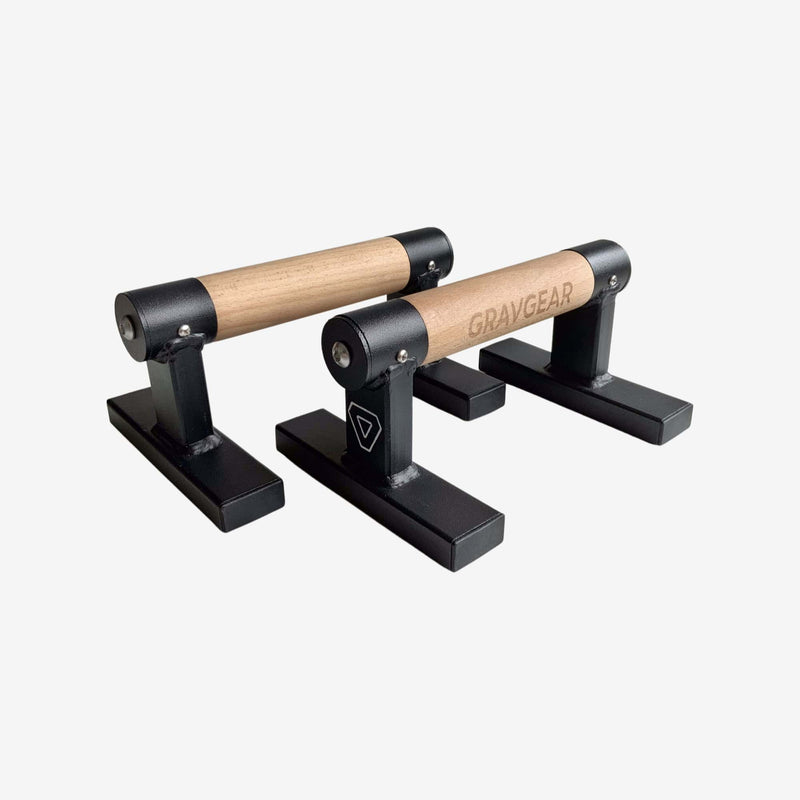 Load image into Gallery viewer, A pair of Grav Parallettes Edge with birch wooden handles and black metal bases.