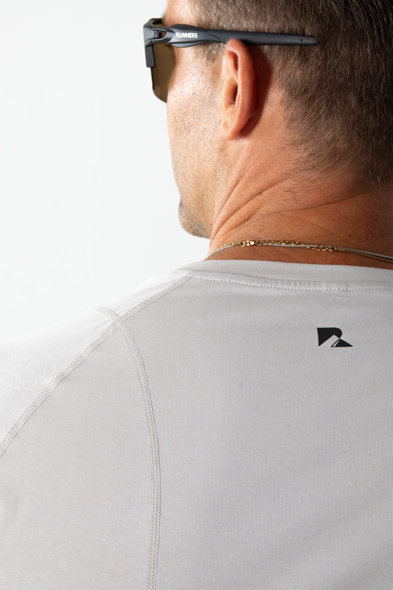 Load image into Gallery viewer, Runner&#39;s Athletics - Airflow Definition Tee Beige
