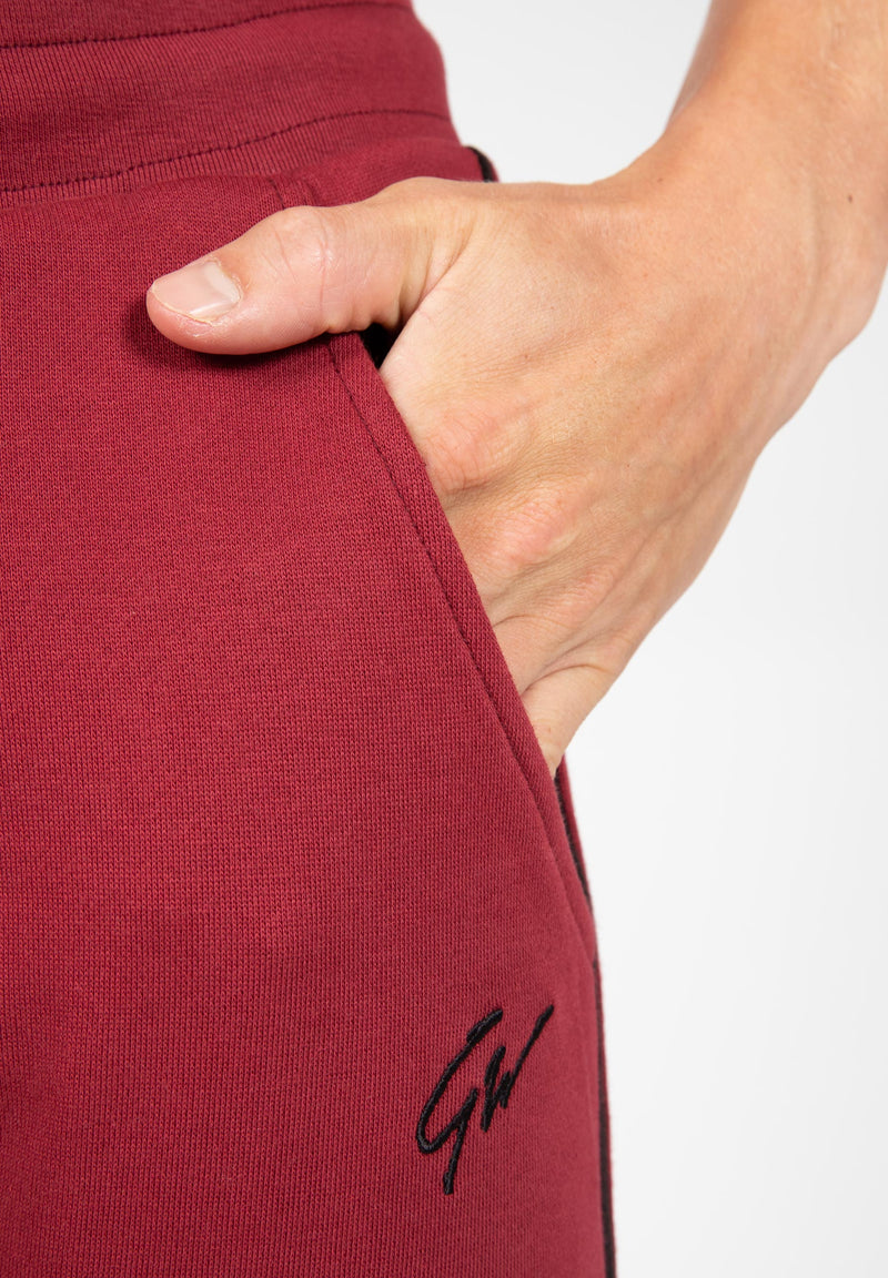 Load image into Gallery viewer, Banks Sweatpants - Burgundy Red/Black
