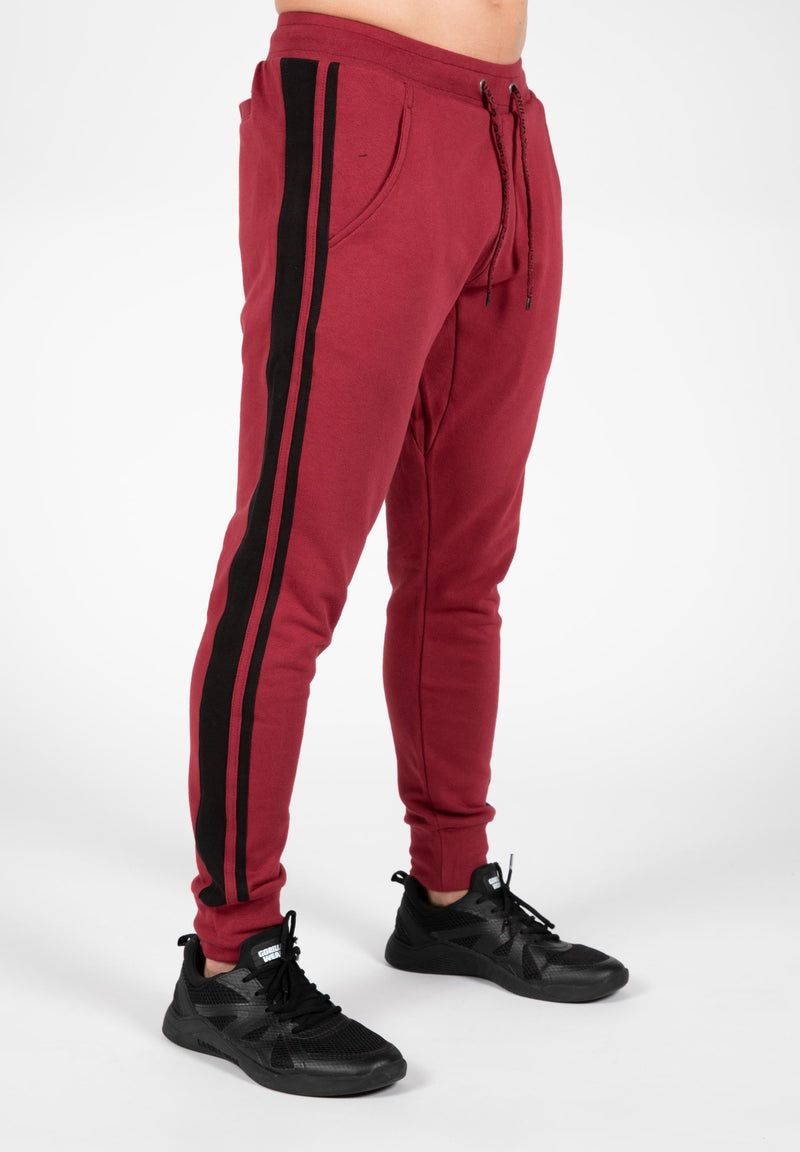 Load image into Gallery viewer, Banks Sweatpants - Burgundy Red/Black
