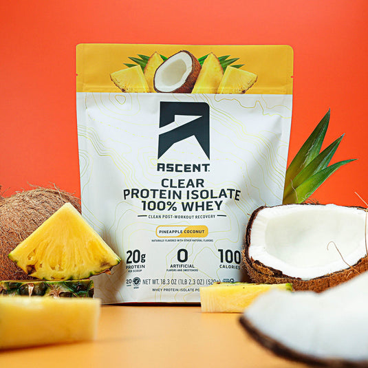 Ascent Clear Whey Isolate - Pineapple Coconut with fresh pineapple and coconut