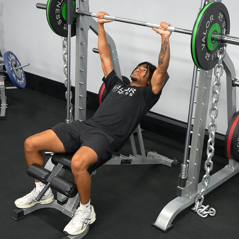 Load image into Gallery viewer, Valor Fitness - Smith Machine with Olympic Storage Pegs
