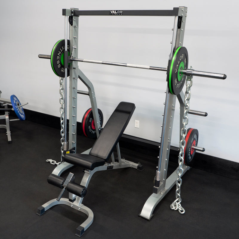 Load image into Gallery viewer, Valor Fitness - Smith Machine with Olympic Storage Pegs
