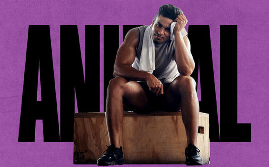 graphic of man sitting down on a box after a workout in front of a purple ANIMAL logo