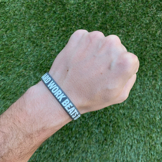 Elite Athletic Gear - Hard work beats talent Wristband
